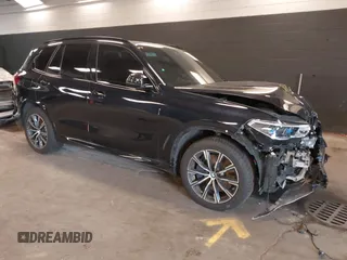 2023 BMW X5 M50i z VIN 5UXJU4C06P9R40495, wystawiony jako IAAI lot #42162049 z przebiegiem 57 179 mil mil oraz . Historia ofert i sprzedaży dostępna na DreamBid. Obrazek 1.