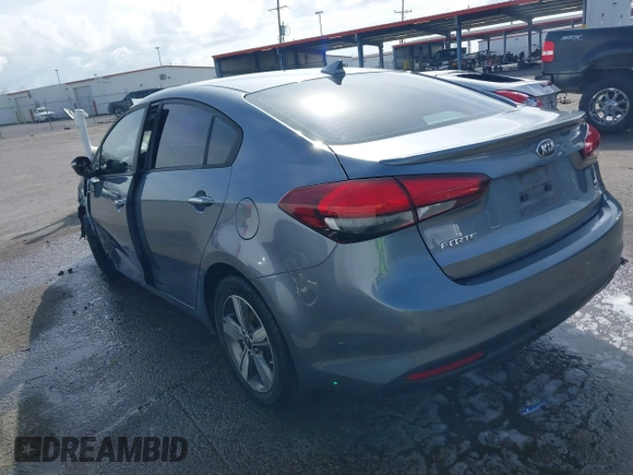 2018 Kia Forte LX with VIN 3KPFL4A79JE194864, listed as a IAAI auction lot 41657793 with 128,256 mi miles and . Bid and sale history available at DreamBid. Image 3.
