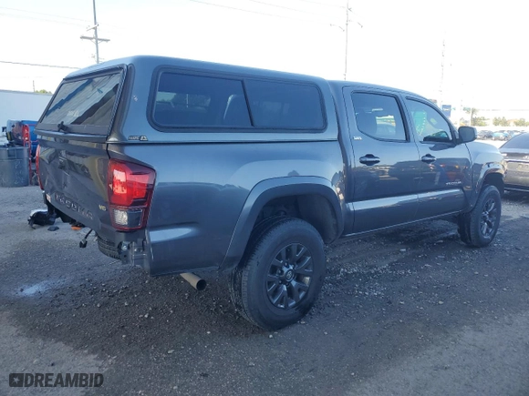 2021 Toyota Tacoma 2WD SR5 with VIN 5TFAZ5CN4MX105040, listed as a Copart auction lot 52088885 with 38,942 mi miles and Salvage Title. Bid and sale history available at carsss.com. Image 3.