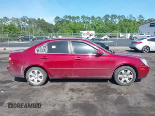 2008 Kia Optima LX z VIN KNAGE123785196642, wystawiony jako IAAI lot #42186620 z przebiegiem 141 368 mil mil oraz . Historia ofert i sprzedaży dostępna na DreamBid. Obrazek 13.