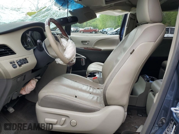2014 Toyota Sienna Limited with VIN 5TDDK3DC0ES074864, listed as a Copart auction lot 55680115 with Not provided miles and Salvage title. Bid and sale history available at DreamBid. Image 7.