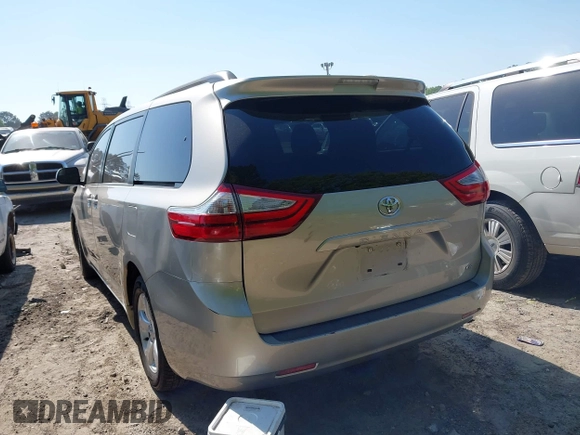 2015 Toyota Sienna LE AAS with VIN 5TDKK3DCXFS552524, listed as a IAAI auction lot 42060065 with 249,332 mi miles and . Bid and sale history available at DreamBid. Image 3.