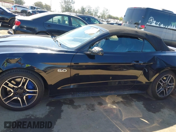 2019 Ford Mustang GT Premium z VIN 1FATP8FF5K5193437, wystawiony jako IAAI lot #42608815 z przebiegiem 67 115 mil mil oraz . Historia ofert i sprzedaży dostępna na DreamBid. Obrazek 14.