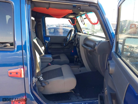2010 Jeep Wrangler Unlimited Sport with VIN 1J4BA3H18AL105500, listed as a IAAI auction lot 41634465 with 230,453 mi miles. Bid and sale history available at carsss.com. Image 5.