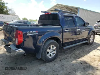 2008 Nissan Frontier SE with VIN 1N6AD07U58C407157, listed as a Copart auction lot 54694315 with 174,465 mi miles and Salvage title. Bid and sale history available at DreamBid. Image 3.