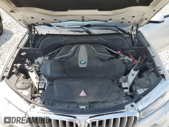 2014 BMW X5 xDrive50i z VIN 5UXKR6C54E0J71803, wystawiony jako Copart lot #60000295 z przebiegiem 130 769 mil mil oraz Czysty tytuł • Clean title. Historia ofert i sprzedaży dostępna na DreamBid. Obrazek 12.
