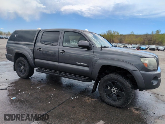 2009 Toyota Tacoma with VIN 3TMLU42N39M024000, listed as a Copart auction lot 55301375 with 210,068 mi miles and Salvage Title. Bid and sale history available at DreamBid. Image 4.
