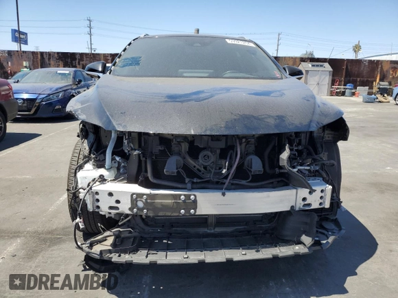 2022 Lexus RX with VIN 2T2YGMDA5NC076315, listed as a Copart auction lot 59921264 with 25,883 mi miles and Salvage Title. Bid and sale history available at carsss.com. Image 5.