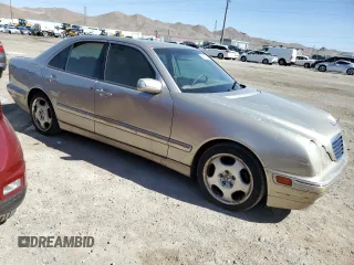 2001 Mercedes-Benz E-Class with VIN WDBJF70J71X052415, listed as a Copart auction lot 53858554 with 167,080 mi miles and Clean Title. Bid and sale history available at carsss.com. Image 4.