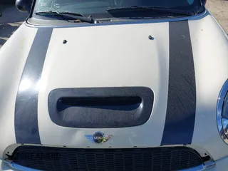 2009 MINI Hardtop S with VIN WMWMF73519TT99560, listed as a IAAI auction lot 41691939 with Not provided miles and . Bid and sale history available at DreamBid. Image 10.