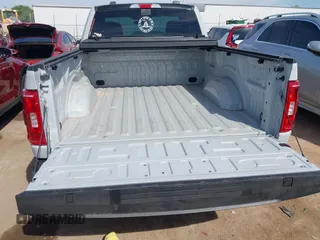 2023 Ford F-150 XL with VIN 1FTMF1C53PKF34184, listed as a IAAI auction lot 42242703 with 27,312 mi miles and . Bid and sale history available at DreamBid. Image 18.