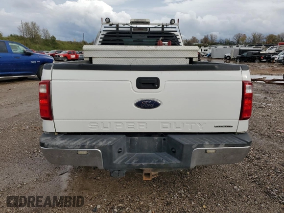 2013 Ford F-250 XL with VIN 1FTBF2A65DEA63805, listed as a Copart auction lot 63109464 with 199,691 mi miles and Salvage Title. Bid and sale history available at DreamBid. Image 6.