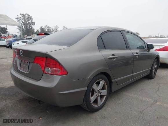 2007 Honda Civic Sdn EX with VIN 1HGFA16867L087102, listed as a IAAI auction lot 42021975 with 174,215 mi miles. Bid and sale history available at carsss.com. Image 4.