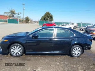 2021 Toyota Camry Hybrid LE with VIN 4T1C31AK4MU553612, listed as a IAAI auction lot 41609111 with 34,399 mi miles. Bid and sale history available at carsss.com. Image 15.