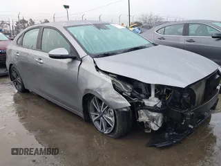 2022 Kia Forte LXS z VIN 3KPF24AD9NE490045, wystawiony jako IAAI lot #41523642 z przebiegiem 58 687 mil mil oraz . Historia ofert i sprzedaży dostępna na DreamBid. Obrazek 1.