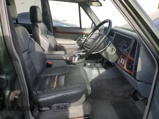 1995 Jeep Cherokee with VIN 1J4FN78SXSL617511, listed as a Copart auction lot 44650885 with 42,598 mi miles and Salvage title. Bid and sale history available at DreamBid. Image 7.