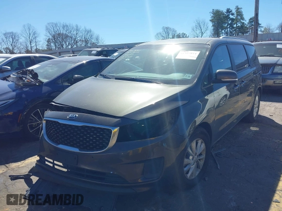 2017 Kia Sedona LX with VIN KNDMB5C14H6329340, listed as a IAAI auction lot 41803814 with 106,672 mi miles. Bid and sale history available at carsss.com. Image 2.