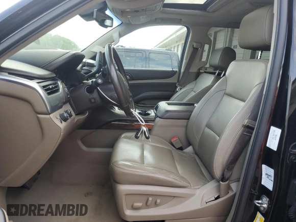 2019 Chevrolet Tahoe LT with VIN 1GNSKBKC2KR349527, listed as a Copart auction lot 58496695 with 128,590 mi miles and Salvage title. Bid and sale history available at DreamBid. Image 7.