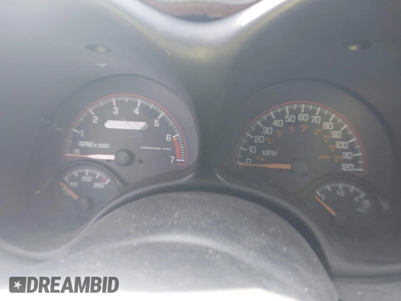 2004 Pontiac Grand Am SE1 z VIN 1G2NF52F04M513755, wystawiony jako IAAI lot #41600613 z przebiegiem Nie podano mil oraz . Historia ofert i sprzedaży dostępna na DreamBid. Obrazek 7.