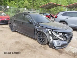 2022 Honda Civic Sport z VIN 2HGFE2F53NH512821, wystawiony jako IAAI lot #42119643 z przebiegiem 93 978 mil mil oraz . Historia ofert i sprzedaży dostępna na DreamBid. Obrazek 1.