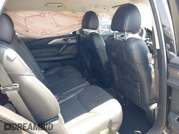 2021 Mazda CX-9 Touring with VIN JM3TCBCY8M0514905, listed as a IAAI auction lot 42385627 with 72,610 mi miles and . Bid and sale history available at DreamBid. Image 8.
