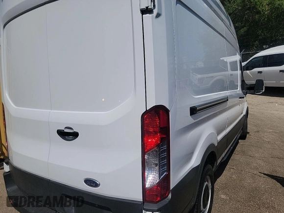 2023 Ford Transit Cargo с VIN 1FTBR1X81PKB13549, выставлен на аукционе IAAI как лот 42556081 с пробегом 68 225 миль миль и . История ставок и продаж доступна на DreamBid. Изображение 8.