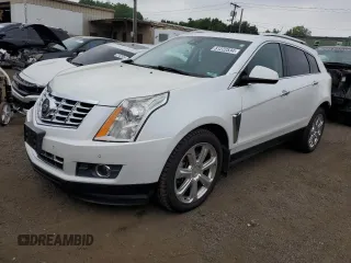 2015 Cadillac SRX Premium Collection with VIN 3GYFNGE32FS528514, listed as a Copart auction lot 61222534 with 104,433 mi miles and Salvage Title. Bid and sale history available at carsss.com. Image 1.