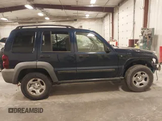 2007 Jeep Liberty Sport with VIN 1J4GL48K67W512690, listed as a IAAI auction lot 41842121 with 199,540 mi miles. Bid and sale history available at carsss.com. Image 13.