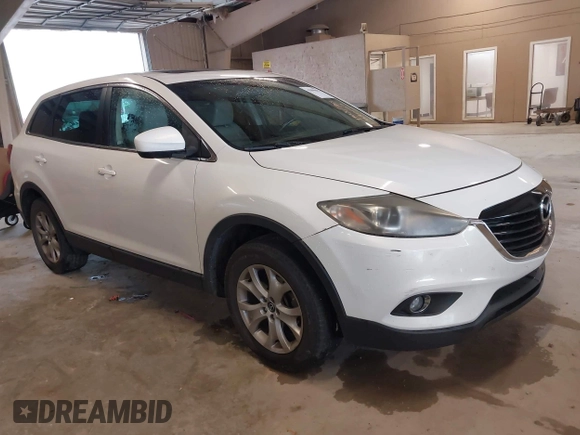 2014 Mazda CX-9 Touring with VIN JM3TB2CA8E0430199, listed as a IAAI auction lot 42090612 with 188,412 mi miles and . Bid and sale history available at carsss.com. Image 1.