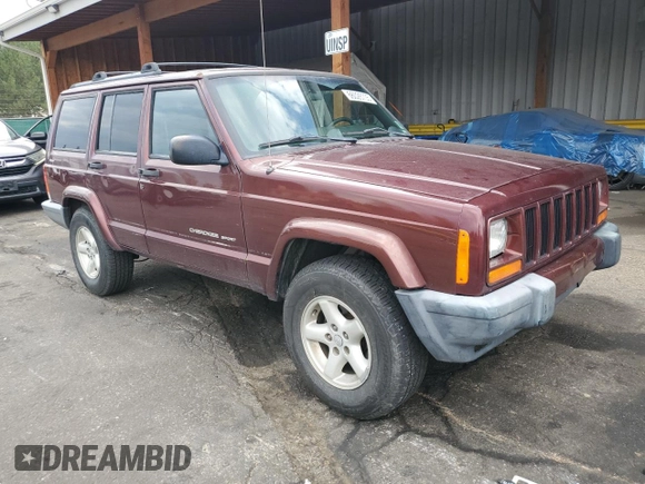 2000 Jeep Cherokee with VIN 1J4FF48SXYL198290, listed as a Copart auction lot 66026705 with 201,409 mi miles and Clean title. Bid and sale history available at DreamBid. Image 4.