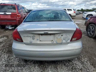 2002 Ford Taurus SES Standard with VIN 1FAFP55U02A115781, listed as a Copart auction lot 59007595 with 97,189 mi miles and Salvage title. Bid and sale history available at DreamBid. Image 6.