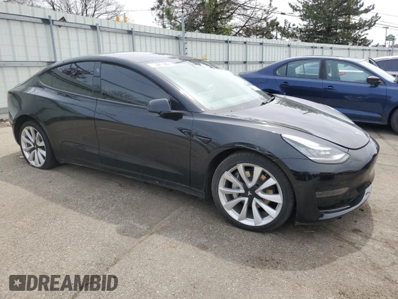 2021 Tesla Model 3 Standard Range Plus with VIN 5YJ3E1EA2MF850760, listed as a Copart auction lot 53487885 with 71,065 mi miles and Clean Title. Bid and sale history available at DreamBid. Image 4.