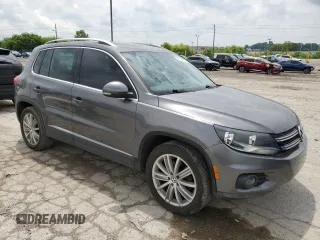 2012 Volkswagen Tiguan SE z VIN WVGAV7AX4CW001417, wystawiony jako Copart lot #61105865 z przebiegiem 168 110 mil mil oraz Czysty tytuł • Clean title. Historia ofert i sprzedaży dostępna na DreamBid. Obrazek 4.