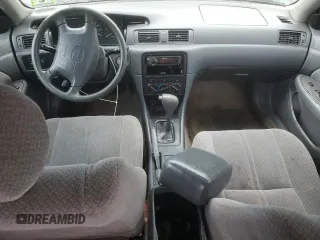 2001 Toyota Camry CE z VIN JT2BG22K710561238, wystawiony jako Copart lot #56686255 z przebiegiem Nie podano mil oraz Szkoda całkowita • Salvage title. Historia ofert i sprzedaży dostępna na DreamBid. Obrazek 8.
