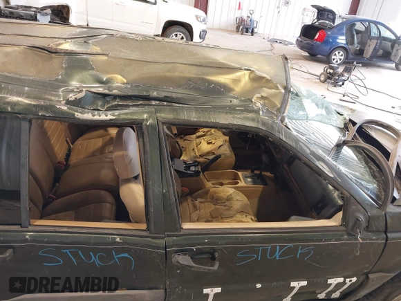 1997 Jeep Grand Cherokee Laredo z VIN 1J4GZ58YXVC729117, wystawiony jako IAAI lot #42244799 z przebiegiem Nie podano mil oraz . Historia ofert i sprzedaży dostępna na DreamBid. Obrazek 19.