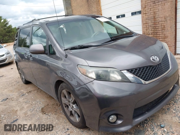 2012 Toyota Sienna SE with VIN 5TDXK3DC2CS235211, listed as a IAAI auction lot 42390354 with 242,602 mi miles and . Bid and sale history available at DreamBid. Image 1.