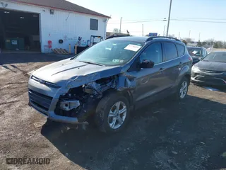 2014 Ford Escape SE with VIN 1FMCU9G91EUC28658, listed as a IAAI auction lot 41738638 with 84,441 mi miles. Bid and sale history available at carsss.com. Image 17.