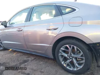 2023 Hyundai Sonata SEL z VIN KMHL64JA1PA321006, wystawiony jako IAAI lot #38313188 z przebiegiem 12 619 mil mil oraz . Historia ofert i sprzedaży dostępna na DreamBid. Obrazek 14.