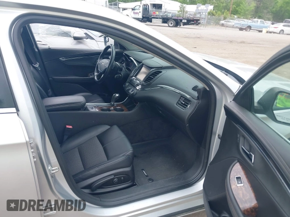 2014 Chevrolet Impala LT with VIN 2G1125S3XE9114130, listed as a IAAI auction lot 42128077 with 209,391 mi miles and . Bid and sale history available at DreamBid. Image 5.