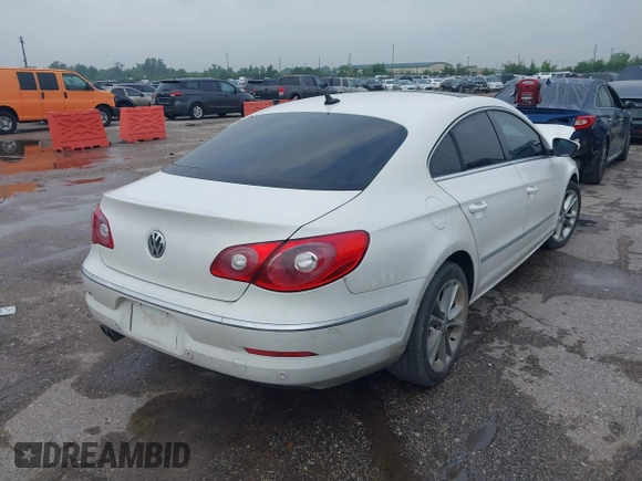 2009 Volkswagen CC Luxury with VIN WVWHL73C39E528446, listed as a IAAI auction lot 42130302 with 231,066 mi miles. Bid and sale history available at carsss.com. Image 4.