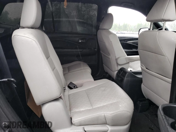 2019 Honda Passport EX-L z VIN 5FNYF8H50KB028465, wystawiony jako Copart lot #56160545 z przebiegiem 100 636 mil mil oraz Szkoda całkowita • Salvage title. Historia ofert i sprzedaży dostępna na DreamBid. Obrazek 11.
