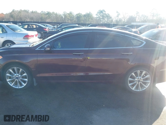 2017 Ford Fusion Titanium with VIN 3FA6P0K96HR137401, listed as a IAAI auction lot 41762567 with 95,958 mi miles. Bid and sale history available at carsss.com. Image 14.