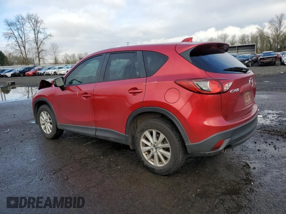 2014 Mazda CX-5 Touring с VIN JM3KE2CY3E0308740, выставлен на аукционе Copart как лот 88127365 с пробегом 137 690 миль миль и Списание • Salvage title. История ставок и продаж доступна на DreamBid. Изображение 2.