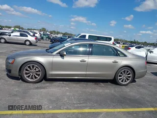 2012 Audi A8 z VIN WAURVAFD0CN001646, wystawiony jako IAAI lot #41524110 z przebiegiem 105 187 mil mil oraz . Historia ofert i sprzedaży dostępna na DreamBid. Obrazek 14.
