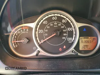 2014 Mazda 2 Touring z VIN JM1DE1LYXE0174854, wystawiony jako Copart lot #56712225 z przebiegiem 163 065 mil mil oraz Szkoda całkowita • Salvage title. Historia ofert i sprzedaży dostępna na DreamBid. Obrazek 9.