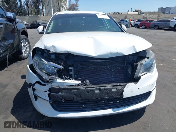 2016 Kia Optima LX with VIN 5XXGT4L37GG121295, listed as a IAAI auction lot 41922348 with 82,238 mi miles. Bid and sale history available at carsss.com. Image 6.