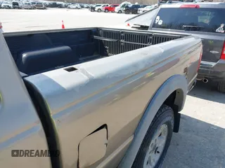 2003 Ford Ranger XL Fleet with VIN 1FTZR45EX3TA42560, listed as a IAAI auction lot 42043472 with 106,051 mi miles and . Bid and sale history available at carsss.com. Image 6.