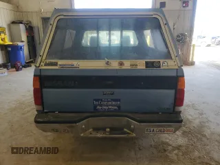 1989 Nissan Hardbody z VIN 1N6HD16S3KC401756, wystawiony jako Copart lot #46811635 z przebiegiem 78 698 mil mil oraz Szkody całkowita. Historia ofert i sprzedaży dostępna na DreamBid. Obrazek 6.