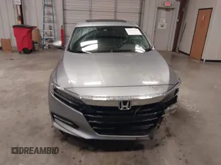 2018 Honda Accord Touring z VIN 1HGCV3F94JA001591, wystawiony jako IAAI lot #42161624 z przebiegiem 100 591 mil mil oraz . Historia ofert i sprzedaży dostępna na DreamBid. Obrazek 13.