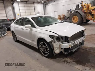 2018 Ford Fusion SE z VIN 3FA6P0LU8JR191629, wystawiony jako IAAI lot #41593290 z przebiegiem 128 875 mil mil oraz . Historia ofert i sprzedaży dostępna na DreamBid. Obrazek 1.